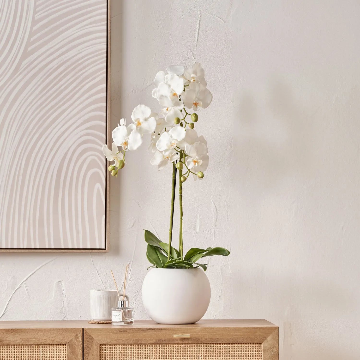 white orchid indoor plant Artificial White Orchid Plant with White Ceramic Pot – Tabletop Realis – Click Style