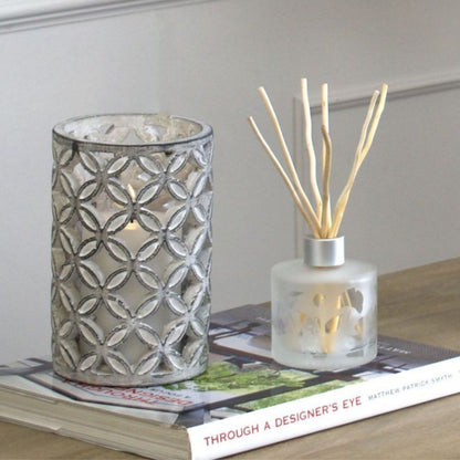 Large stone candle hurricane in a geometric design in grey and white finish