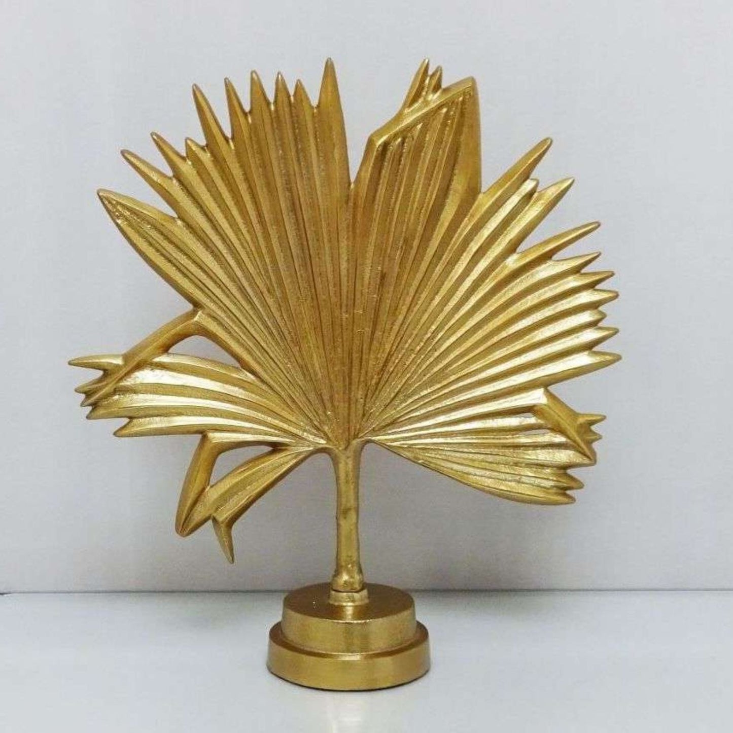 Gold sculpture ornament in a foliage design