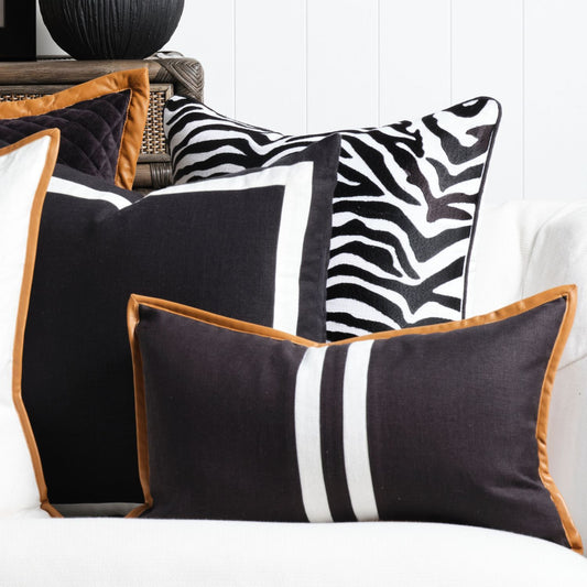 Lumbar Black, white and tan cushion 30x50