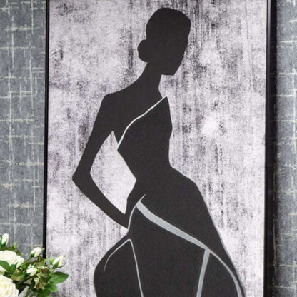 Female painting with foil in black and white