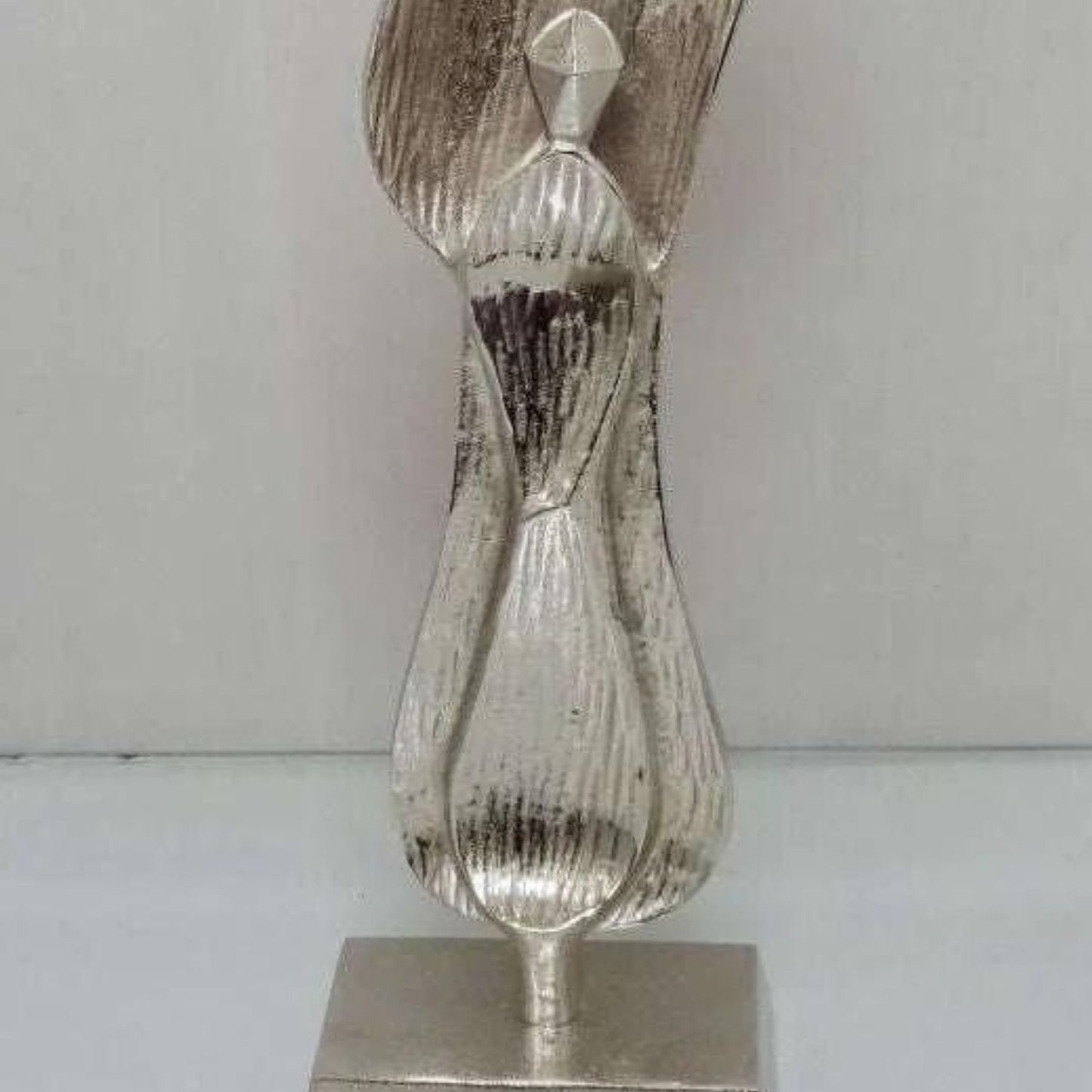 Family sculpture ornament in silver entitled Family Bonds