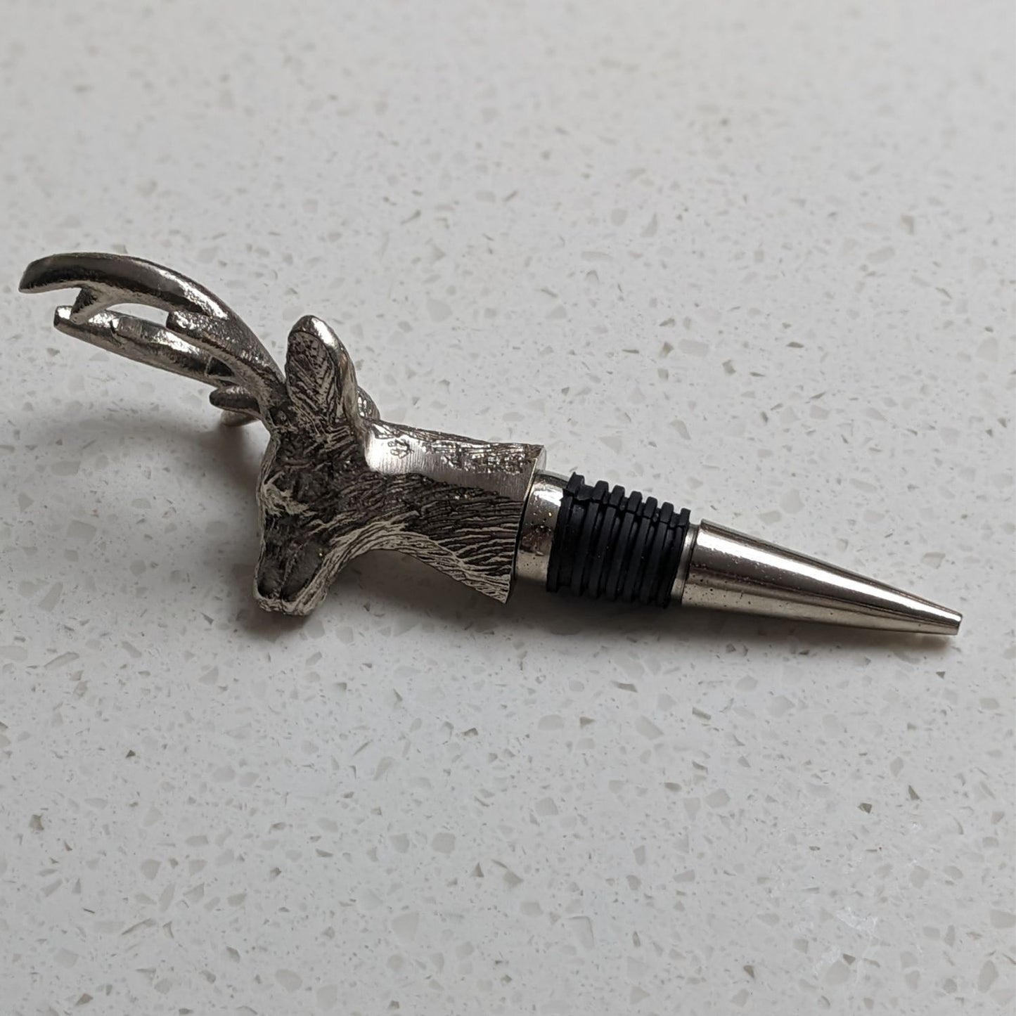 Silver stag bottle stopper.