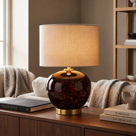 Amber & Brown Tortoiseshell Glass Table Lamp with Natural Linen Shade styled on a dark wood desk in a contemporary neutral home study with warm ambient lighting 44x30x30cm | Click Style