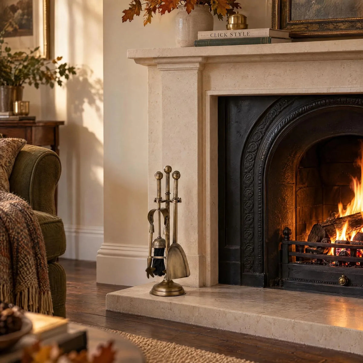 Antique Brass Fireside Companion Set with Ball-Topped Handles – 4 Piece Metal Fireplace Tool Set 40x12x12cm beside limestone fireplace with traditional cast iron fire | Click Style