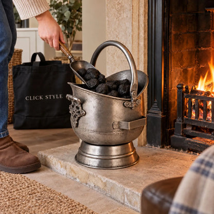 Antique Pewter Effect Silver Coal Bucket with Wooden-Handled Shovel – Ornate Steel Fireside Coal Scuttle 44x30x28cm – Wooden-Handled Shovel Being Used to Scoop Coal Beside Fireplace | Click Style