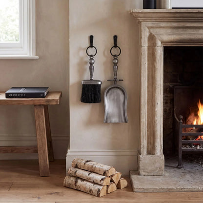 Antique Pewter Effect Silver Hearth Tidy Set with Brush & Shovel – Steel Fireplace Cleaning Set 37x14x10cm hanging beside a traditional fireplace | Click Style