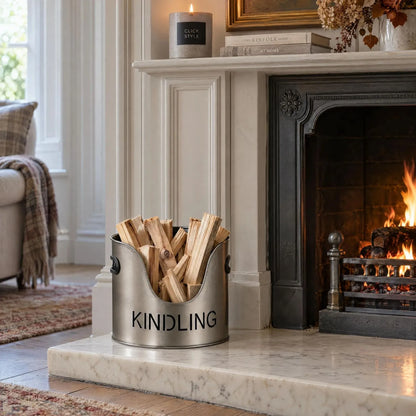 Antique Pewter Effect Silver Log & Kindling Buckets with Matchstick Holder – 3 Piece Metal Fireside Set with Cut-Out Lettering – KINDLING Bucket Filled with Kindling Beside Traditional Open Fireplace | Click Style