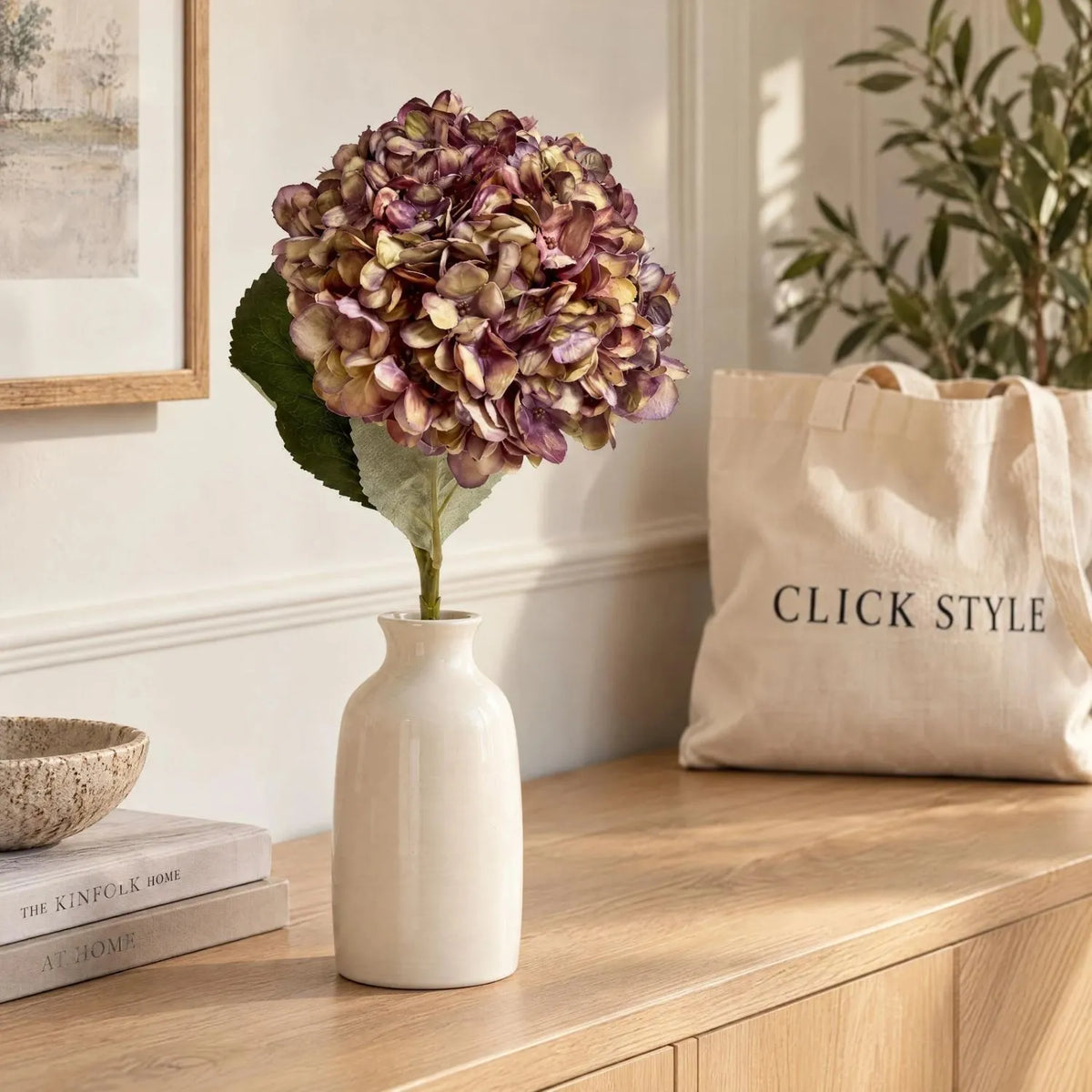Artificial Burgundy & Plum Hydrangea Stem with Realistic Green Leaves – Lifelike Faux Purple Hydrangea Flower 42x18x18cm – Single Hydrangea Stem Displayed in Cream Ceramic Vase on Oak Console Table with CLICK STYLE Branding | Click Style
