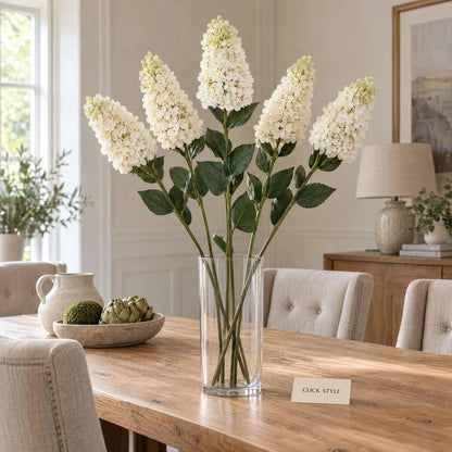 Artificial Creamy White Long Stem Spear Hydrangea with Pointed Flower Head & Realistic Green Leaves – Tall Faux Cream Hydrangea Flower 88cm styled as five individual stems in a tall clear glass vase on a natural oak dining table | Click Style