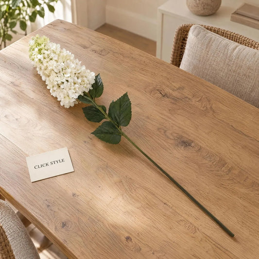 Artificial Creamy White Long Stem Spear Hydrangea with Pointed Flower Head & Realistic Green Leaves – Tall Faux Cream Hydrangea Flower 88cm displayed diagonally on a natural oak dining table with CLICK STYLE branding | Click Style