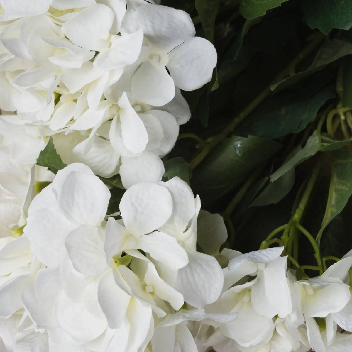 Artificial Creamy White Multi-Bloom Hydrangea Bouquet Stem with Realistic Green Foliage – Lifelike Faux Cream Hydrangea Arrangement 54x34x34cm – Close-Up of Textured White Hydrangea Petals with Cream Undertones and Realistic Green Branching Stems | Click Style