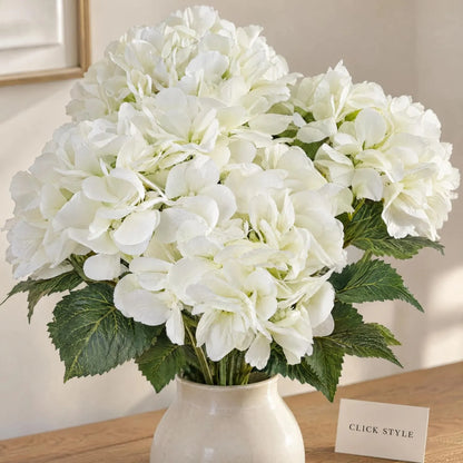 Artificial Creamy White Multi-Bloom Hydrangea Bouquet Stem with Realistic Green Foliage – Lifelike Faux Cream Hydrangea Arrangement 54x34x34cm Close-Up Showing Detailed Creamy White Petals Flower Heads and Veined Green Leaves | Click Style
