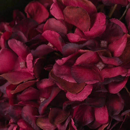 Artificial Deep Ruby Red & Burgundy Hydrangea Stem with Realistic Green Leaves – Lifelike Faux Red Hydrangea Flower 42x18x18cm – Extreme Close-Up Showing Realistic Fabric Petal Texture and Deep Burgundy Colour Variations | Click Style