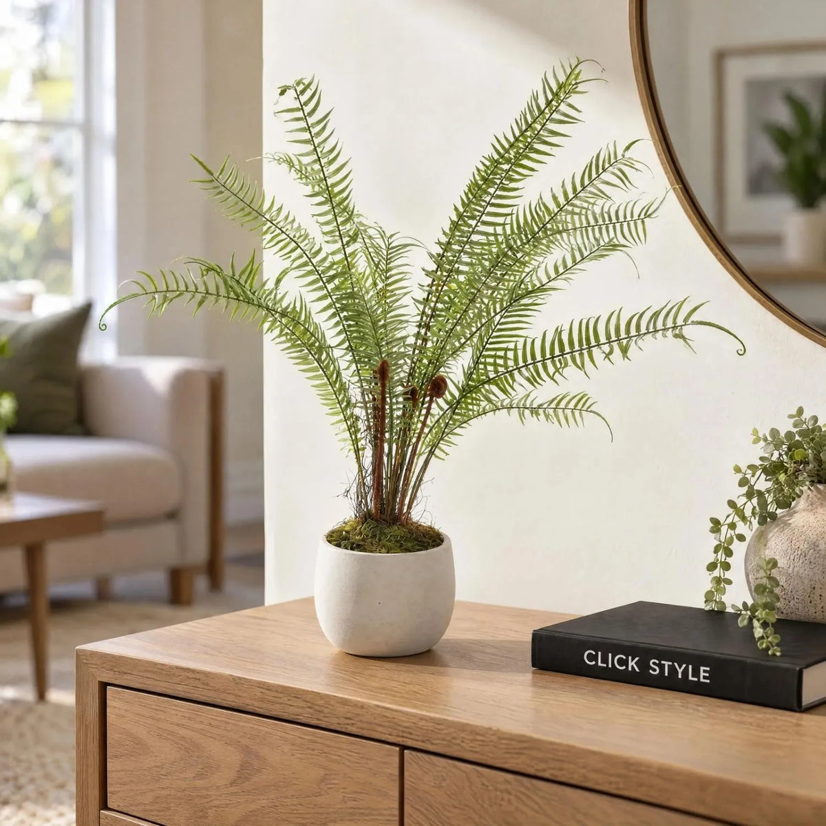 Artificial Small Green Boston Fern with Delicate Fronds & Fiddlehead Details in White Stone Pot – Realistic Potted Faux Indoor Plant 46x10x10cm – Styled on Natural Oak Console Table with Black CLICK STYLE Book | Click Style