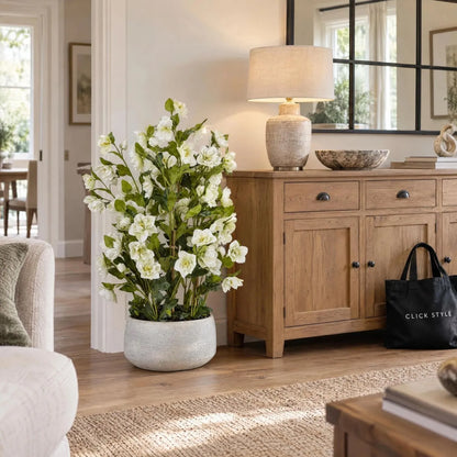 Artificial White Hellebore Plant in Textured Grey Pot – Realistic White Faux Christmas Rose Flower Arrangement 85x52x52cm – Styled Beside Natural Wood Sideboard | Click Style