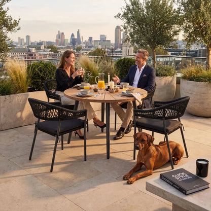 Black 4-Seater Outdoor Rope Garden Dining Set with Cushions – Round Acacia Wood Table & Powder-Coated Aluminium Chairs 77x120x120cm – contemporary black rope garden dining set with woven outdoor chairs, light teak-effect acacia wood tabletop, season-proof cushions, powder-coated aluminium frame and luxury patio furniture styling for terraces, courtyards and alfresco outdoor living | Click Style