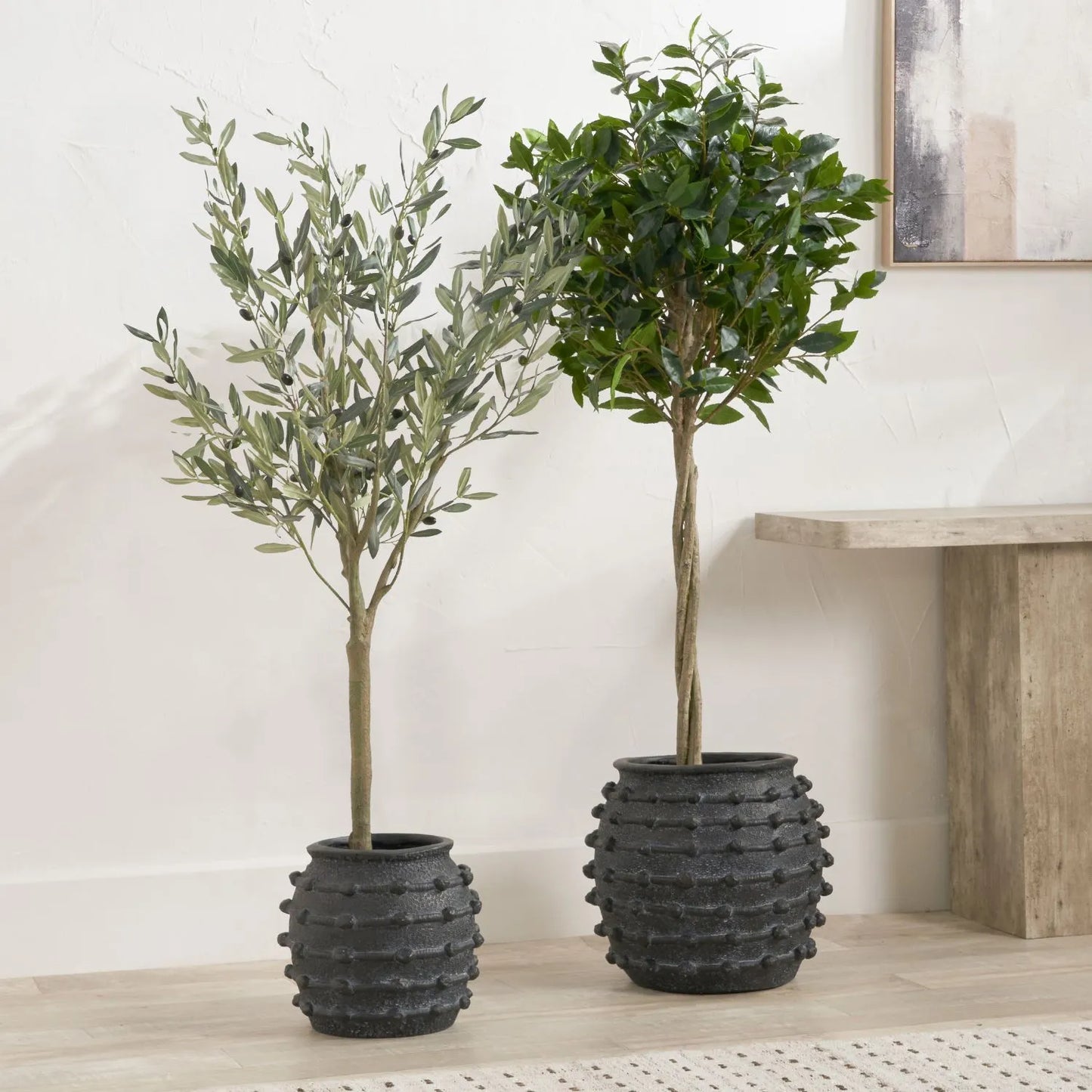 Black bobbled fibrestone decorative planter with textured stone-effect finish, indoor plant pot 29x32x32cm | Click Style