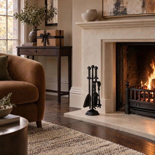 Black Fireside Companion Set with Ball-Topped Handles – 4 Fireplace Tools & Stand 40x12x12cm – styled beside a pale limestone fireplace in a contemporary British interior | Click Style