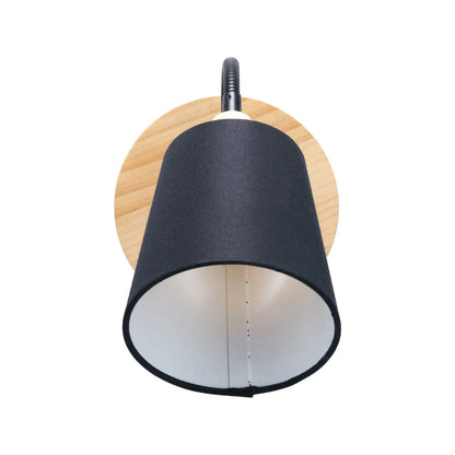 Black metal wall light with adjustable tapered linen shade and natural wood plate – modern bedside reading light | Click Style