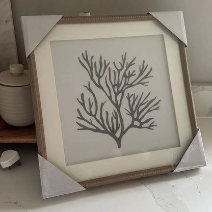 Black & White Coral Print Artwork with Natural Brown Beaded Wooden Frame – Square Coastal Design 40x40cm | Click Style – customer photo showing framed coral artwork with protective corner packaging