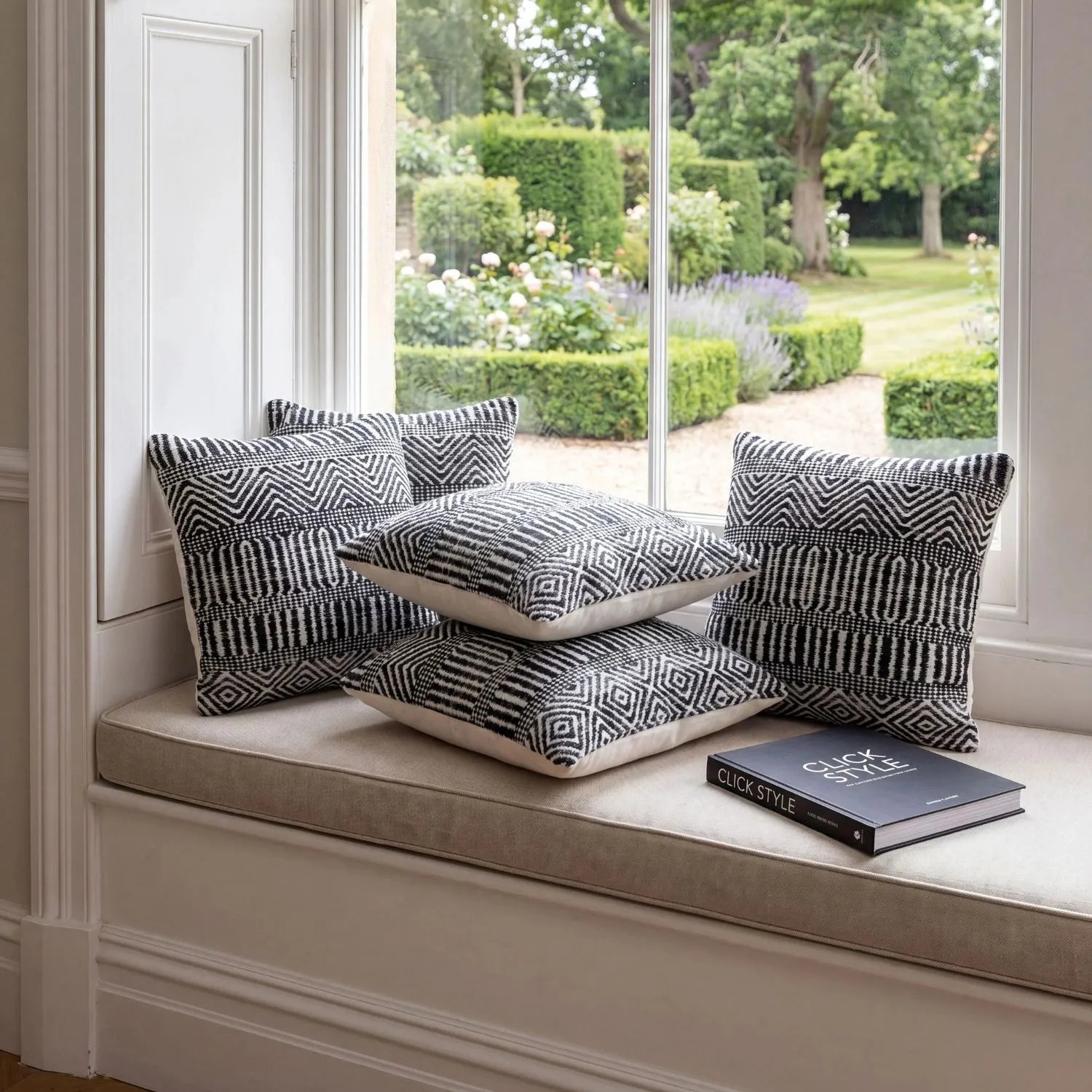 Black & White Square Indoor Outdoor Cushion with Tribal Pattern – Recycled Weather-Resistant & Durable 45x45x10cm featuring a bold black and white tribal-inspired geometric pattern, woven textured finish and recycled PET fabric for garden furniture, patios, balconies, conservatories and modern homes | Click Style