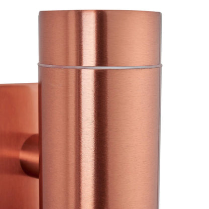 Brushed Copper Outdoor Up & Down PIR Motion Sensor Wall Light Illuminating an Exterior Wall with Dual Up and Down Light Beams | Click Style