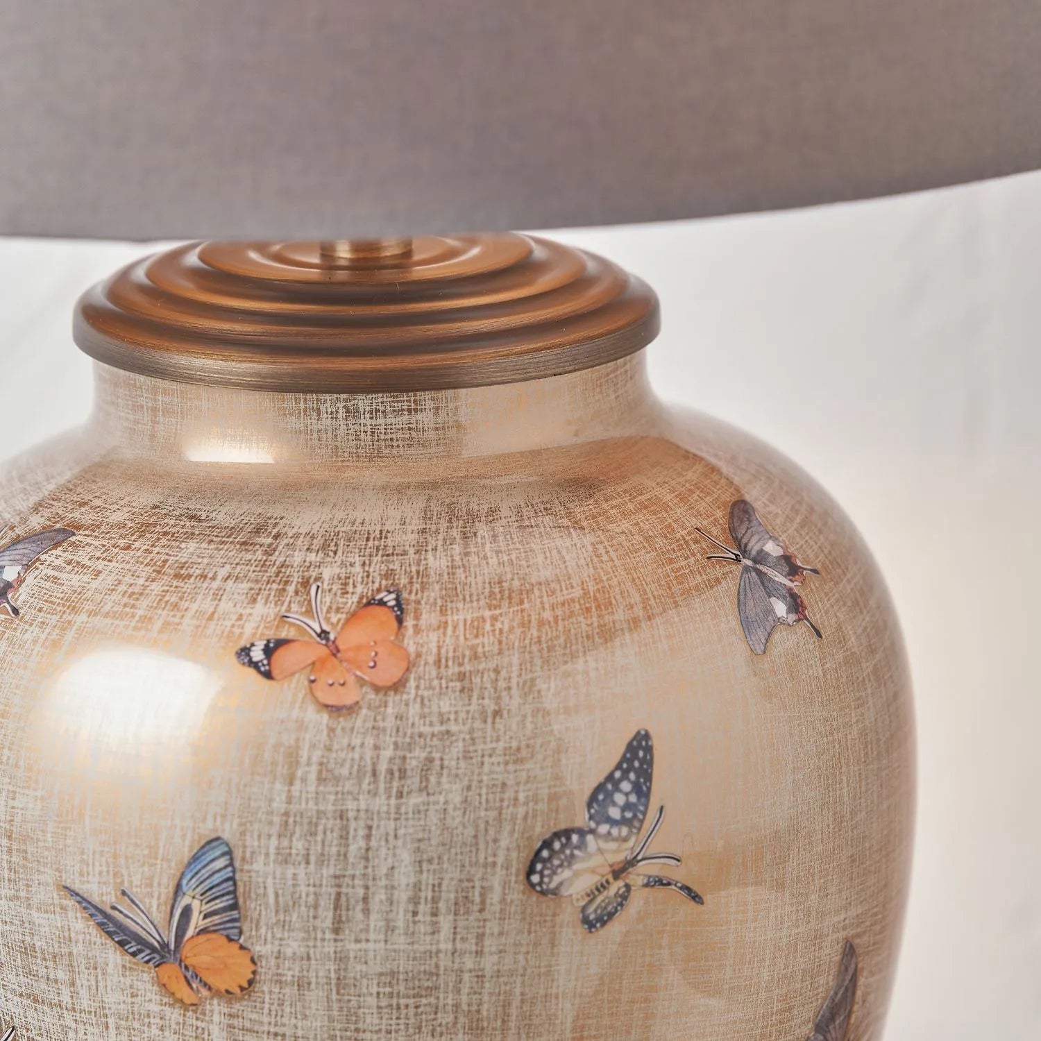Jenny Worrall butterflies distressed gold and off-white bulbous glass table lamp base with antique brass feet – handcrafted small butterfly statement lighting 30x16x16cm | Click Style