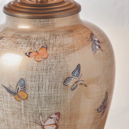 Jenny Worrall butterflies distressed gold and off-white bulbous glass table lamp base with antique brass feet – handcrafted small butterfly statement lighting 30x16x16cm | Click Style