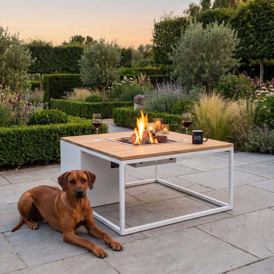 Cosiloft 100 Square Outdoor Gas Fire Pit Table with White Metal Base & Teak Wood Top – Freestanding Garden Coffee Table Firepit 50x100x100cm – luxury outdoor propane gas fire pit table with concealed 5kg gas bottle storage, integrated gas burner with ceramic logs and lava stones, 9kW heat output, weather-resistant white aluminium frame, solid teak wood top and contemporary garden firepit coffee table for patios, terraces and outdoor seating areas | Click Style
