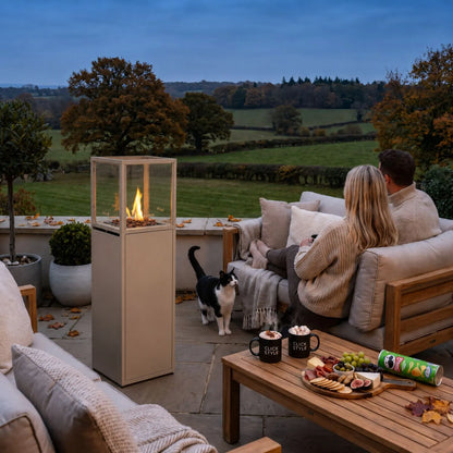 Cosipillar Beige Taupe Metal Floor-Standing Outdoor Gas Fire Lantern with Glass Guard, Lockable Wheels and Lava Stones 116x40x40cm | Click Style