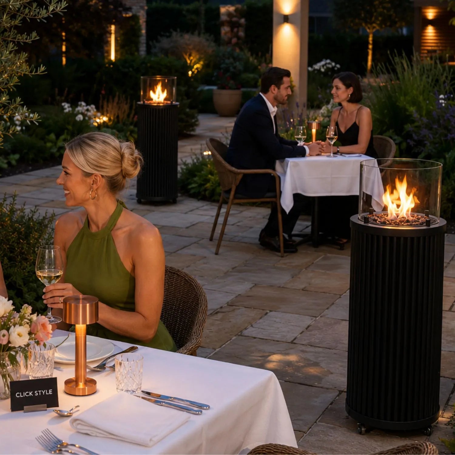 Cosipillar Matt Black Ribbed Metal Cylindrical Floor-Standing Outdoor Gas Fire Lantern with Glass Guard Hidden Propane Storage Lockable Wheels Lava Stones 4kW Adjustable Flame Outdoor Heater for Gardens Patios Terraces and Balconies 106x40x40cm | Click Style
