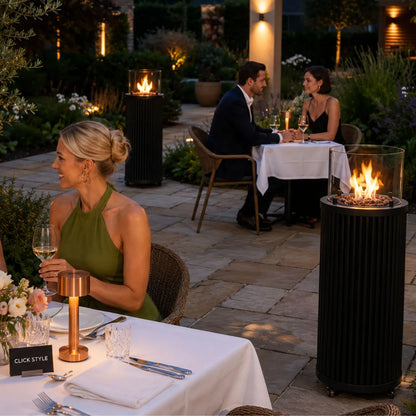 Cosipillar Matt Black Ribbed Metal Cylindrical Floor-Standing Outdoor Gas Fire Lantern with Glass Guard Hidden Propane Storage Lockable Wheels Lava Stones 4kW Adjustable Flame Outdoor Heater for Gardens Patios Terraces and Balconies 106x40x40cm | Click Style