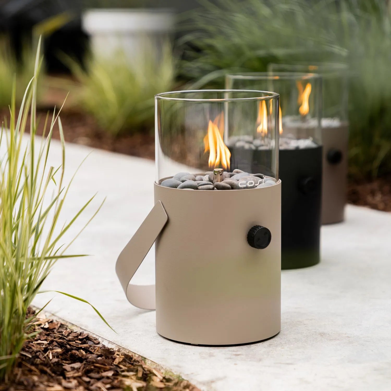 Cosiscoop Beige Taupe Metal & Glass Gas Fire Lantern with Cylindrical Base & Handle - Outdoor Tabletop Firepit 30x16x16cm - Click Style