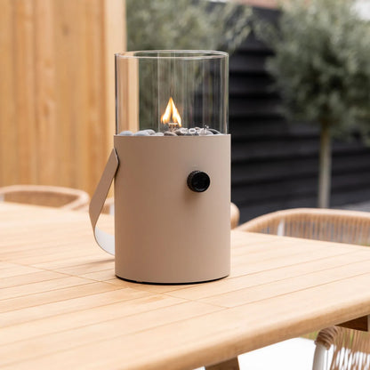 Cosiscoop Beige Taupe Metal & Glass Gas Fire Lantern with Cylindrical Base & Handle - Outdoor Tabletop Firepit 30x16x16cm - Click Style