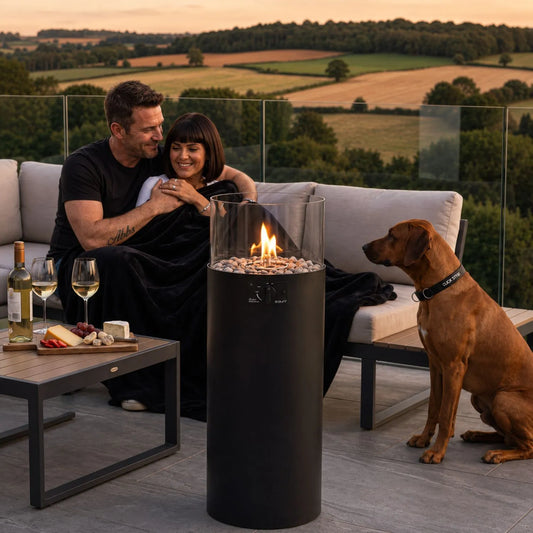 Cosiscoop Matt Black Outdoor Gas Fire Lantern with Cylindrical Metal Design Glass Guard Hidden 5kg Propane Gas Bottle Compartment Decorative Pebbles Floor-Standing 106x36x41cm | Click Style