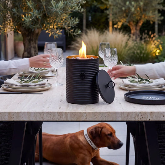 Cosiscoop Matt Black Ribbed Metal Cylindrical Outdoor Tabletop Gas Fire Lantern with Matching Lid Gold Interior and Pebble Stones 25x16x16cm | Click Style