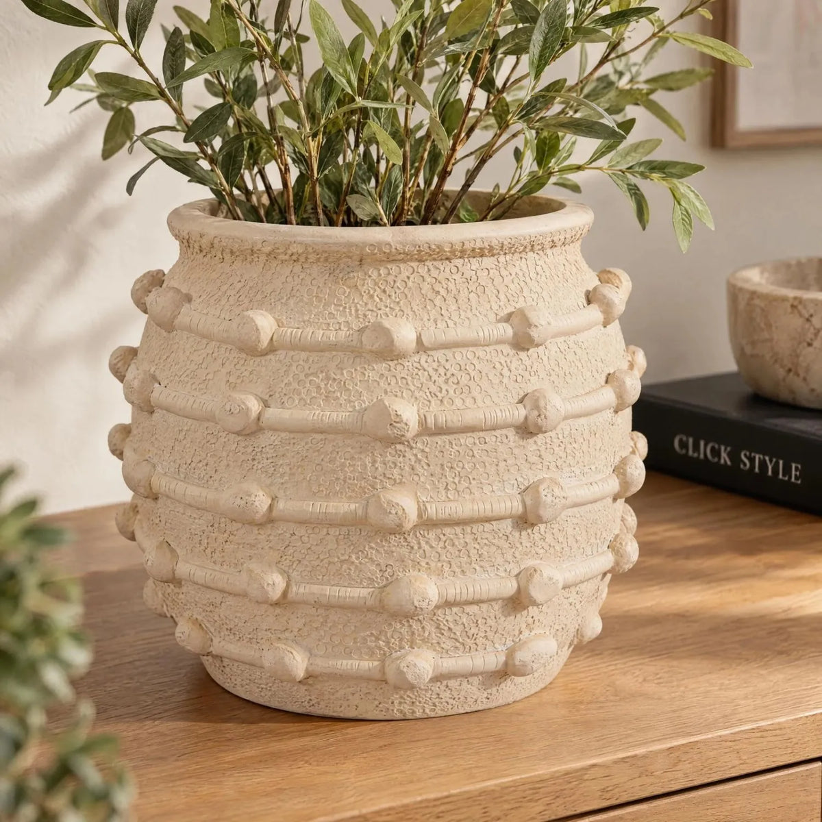 Cream Bobbled Fibrestone Planter with Rolled Rim & Raised Textured Detail – Decorative Indoor Plant Pot 29x32x32cm – Close-Up Textured Fibrestone Detail with Artificial Foliage | Click Style