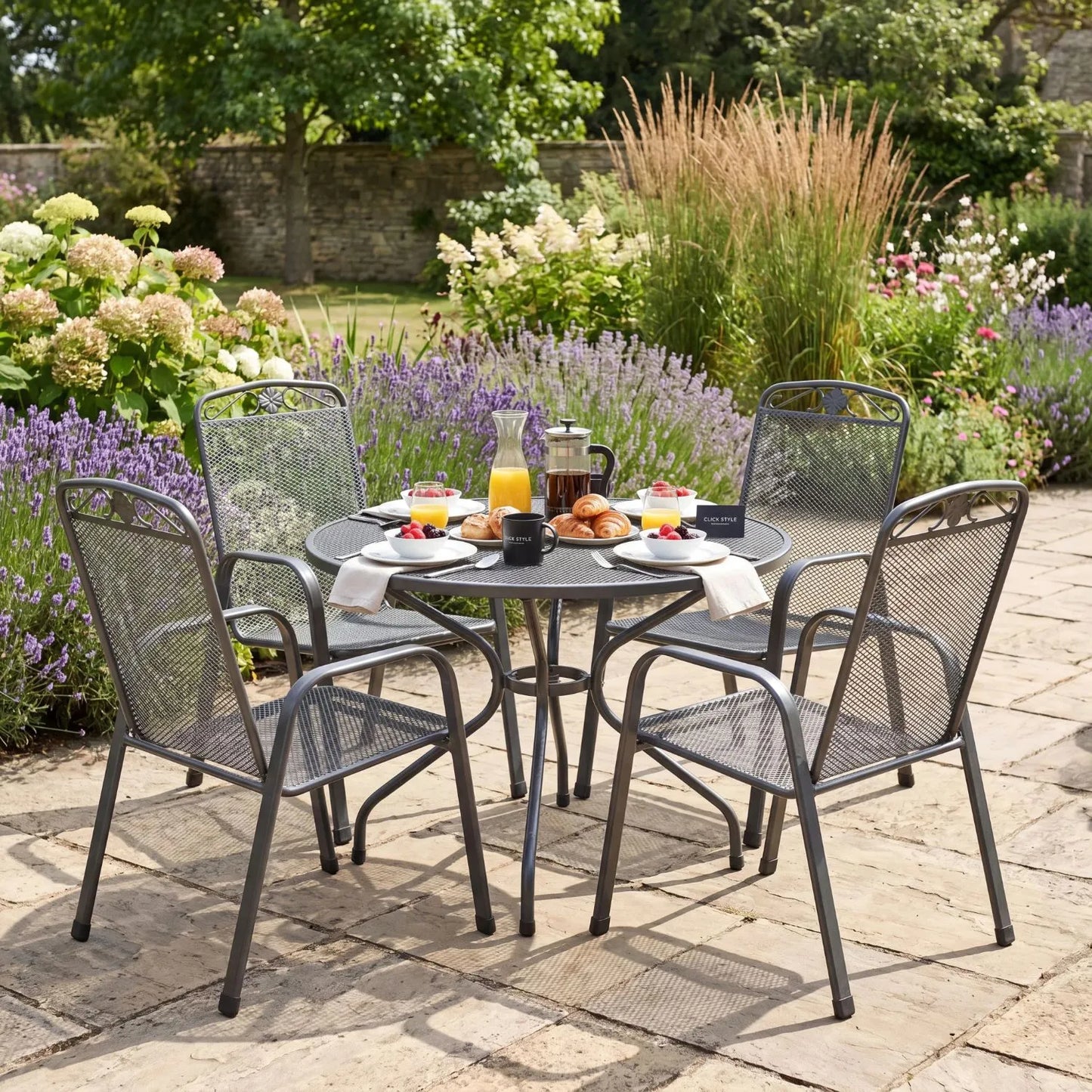 Dark Grey 4-Seater Round Metal Garden Dining Set with Floral Detail – Powder-Coated Steel Outdoor Table & Chairs H74xW105xD105cm with Round Mesh Dining Table, Breathable Mesh Chairs, Curved Armrests, Stackable Seating, Central Parasol Hole and Weather-Resistant Elotherm Finish for Patios, Terraces and Gardens | Click Style