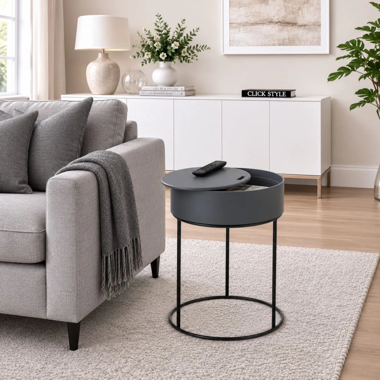 Dark Grey Round Storage Side Table with Black Metal Frame and Hidden Storage Removable Lid Styled Beside Grey Sofa in Contemporary Living Room 51.5x38cm | Click Style