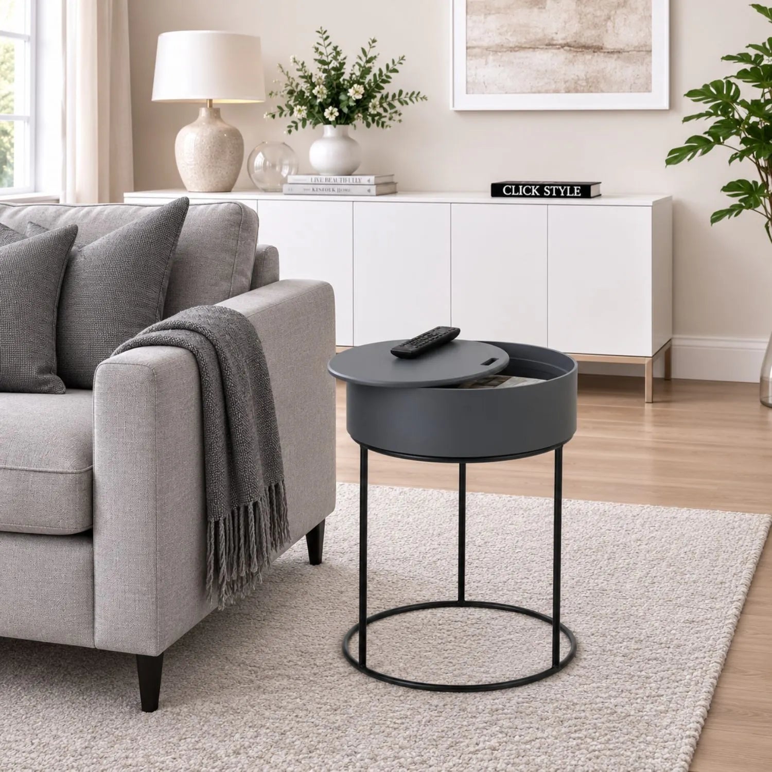 Dark Grey Round Storage Side Table with Black Metal Frame and Hidden Storage Removable Lid Styled Beside Grey Sofa in Contemporary Living Room 51.5x38cm | Click Style