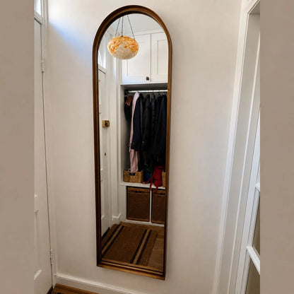 Full Length Aged Bronze Channel Frame Arched Wall Mirror styled in a customer hallway | Click Style