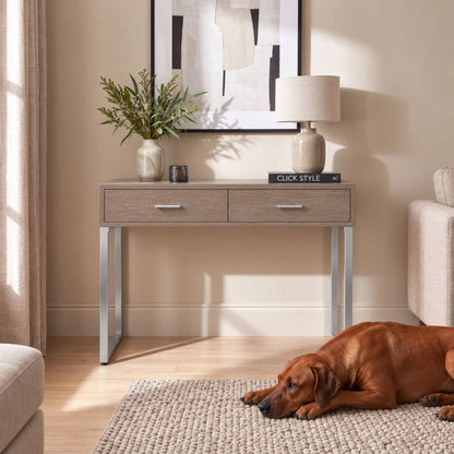 Grey Wash Mango Wood 2 Drawer Dressing Table & Desk with Silver Metal Handles & Legs styled in a neutral living room with Rhodesian Ridgeback | Click Style