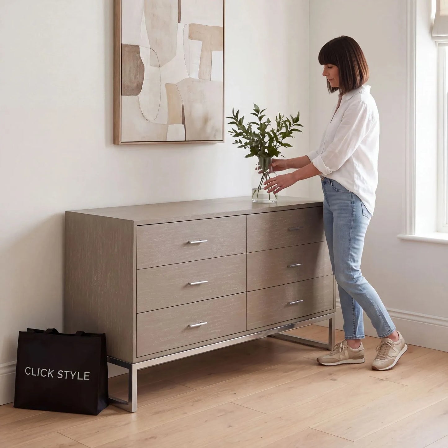 Grey Wash Mango Wood 6 Drawer Chest of Drawers with Silver Metal Handles & Legs 73x130x49cm styled in a contemporary dressing room with Abbie | Click Style