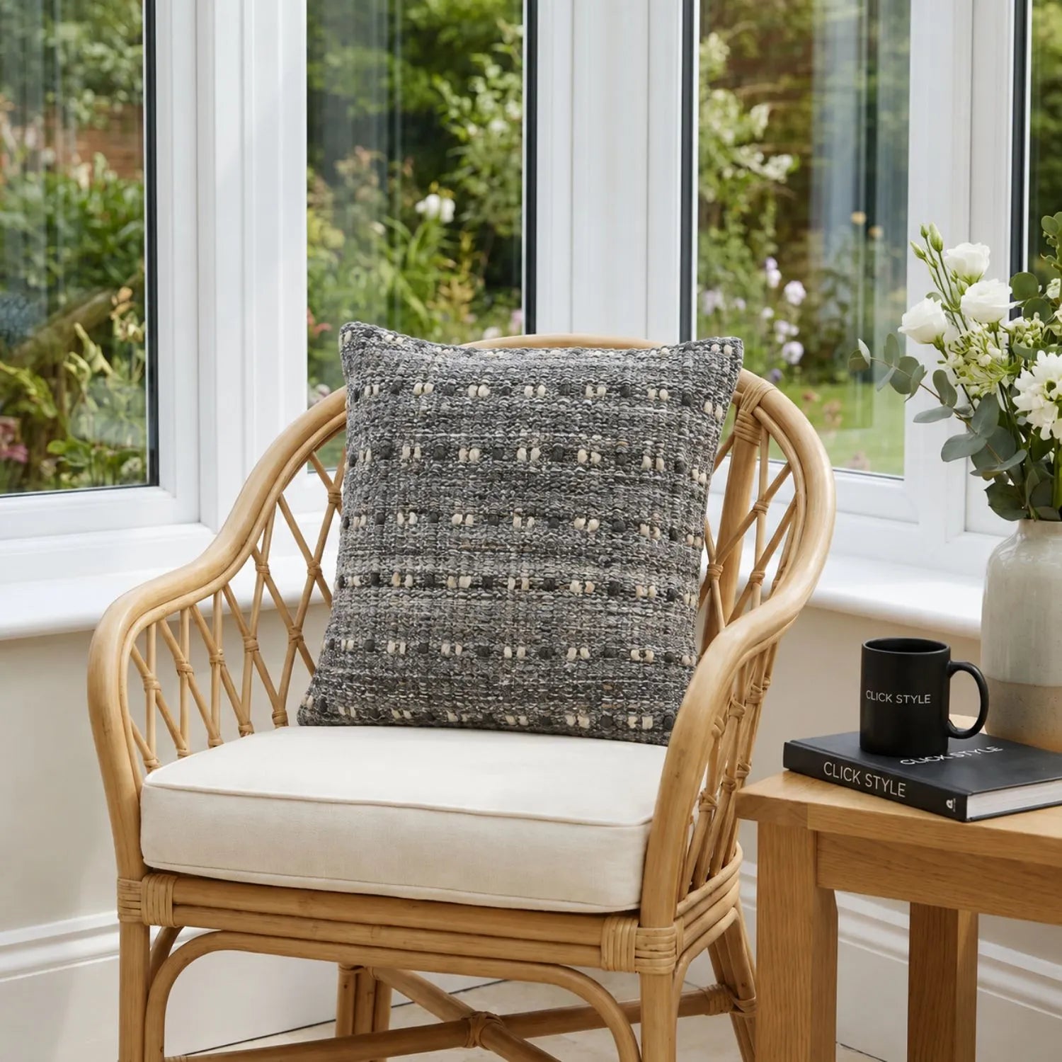 Grey & White Square Indoor Outdoor Cushion with Textured Woven Design Styled on Luxury Outdoor Garden Lounger | Click Style