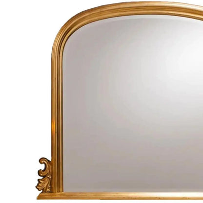 Large Antique Gold Overmantel Mirror with Arched Top & Ornate Scrollwork – Bevelled Glass Gold Leaf Effect Mantle Mirror 94x118x6cm close-up of the left lower corner showing ornate curled scrollwork, carved leaf decoration and antique gold frame detailing | Click Style