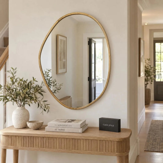 Large Antique Gold Pebble Shaped Wall Mirror with Irregular Curved Edges & Textured Metal Frame – Decorative Organic Mirror 90x70x2.5cm displayed above a light oak console table in a contemporary hallway with CLICK STYLE branding | Click Style