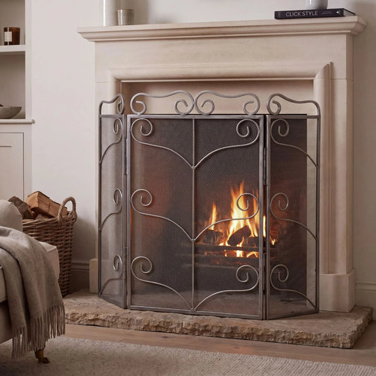 Large Antique Silver 3 Panel Folding Firescreen with Ornate Scrollwork – Steel Fireplace Fire Guard 75x85x2cm styled in front of a stone fireplace | Click Style