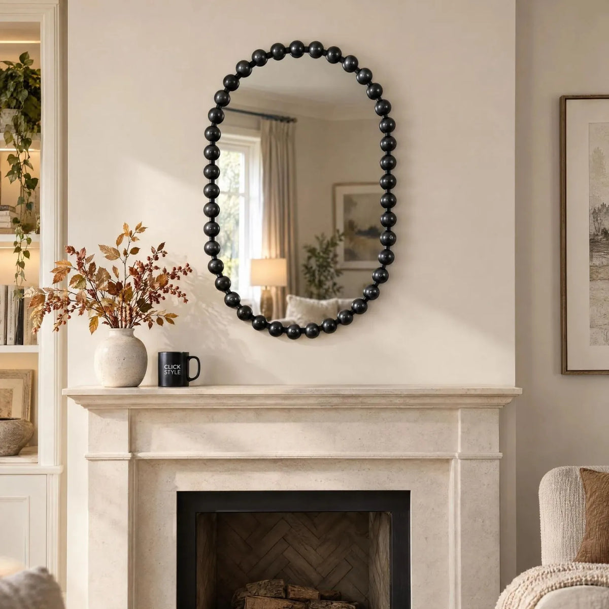 Large Black Bobbin Wall Mirror with Raised Bobbin Frame – Oval Racetrack Pill Shaped Decorative Mirror 90x60x5cm – Styled Above Pale Limestone Fireplace & Mantelpiece | Click Style