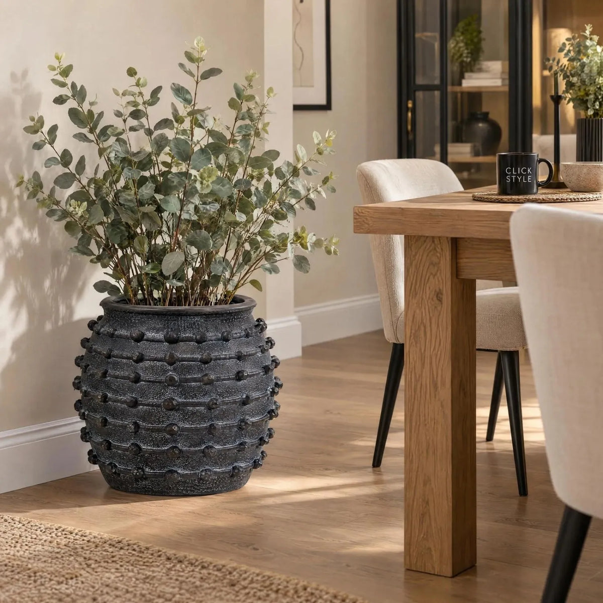 Large Black Bobbled Fibrestone Planter with Rolled Rim & Raised Textured Detail – Decorative Indoor Plant Pot 39x42x42cm – Styled with Artificial Eucalyptus in Contemporary Dining Room | Click Style